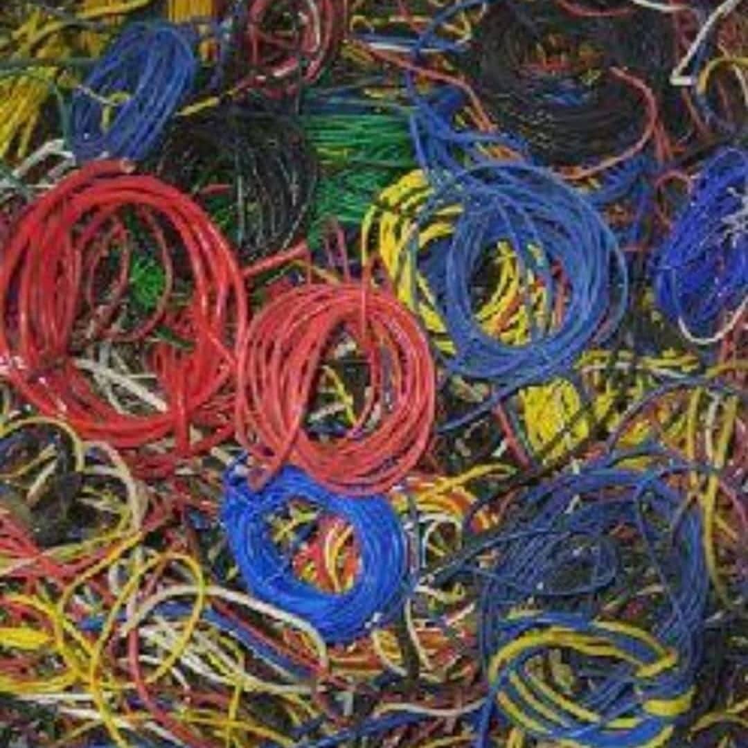 Bundles of coloured electrical wire scrap